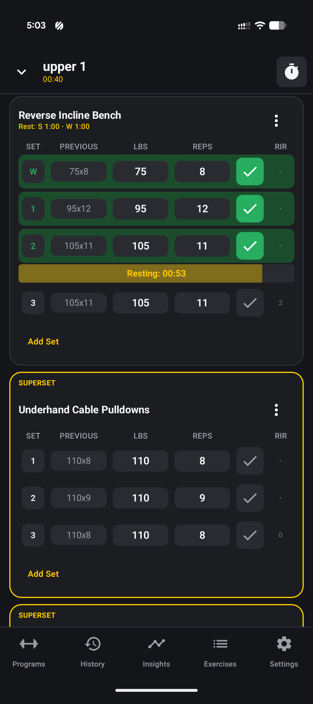 Loadex live session screen showing Reverse Incline Bench with logged sets, a rest timer, and a superset with Underhand Cable Pulldowns