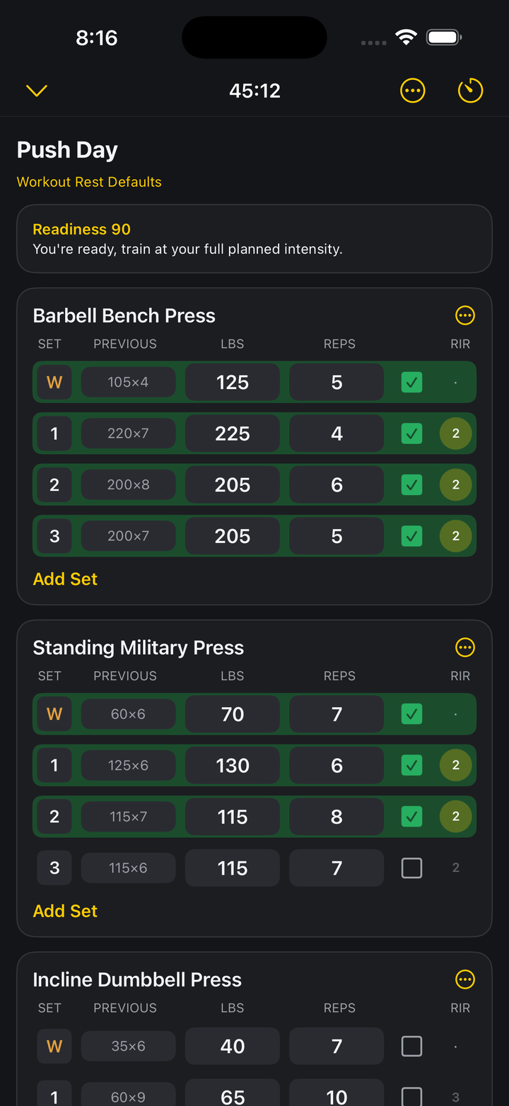 Loadex live Push Day session showing logged Barbell Bench Press sets with previous-session weights alongside each target